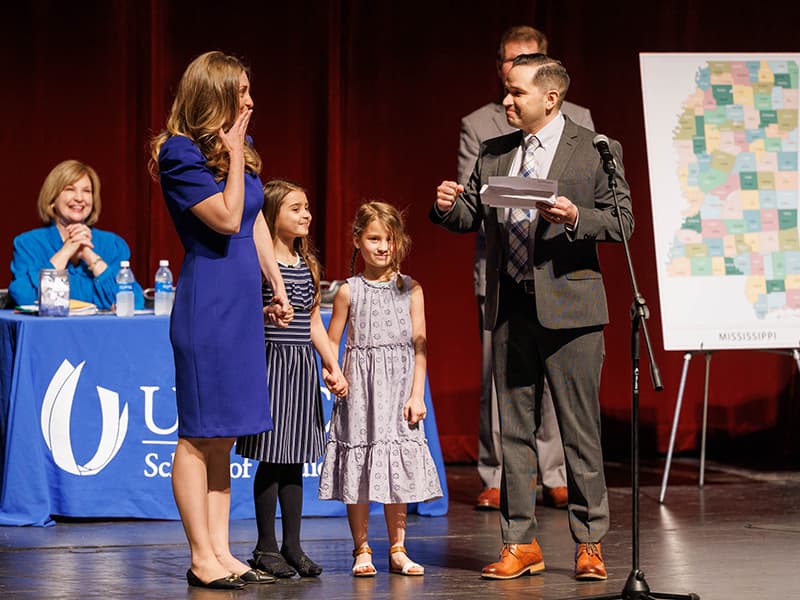 M4 Ezekiel Gonzalez, wife Meredith and daughters Emma and Audrey.